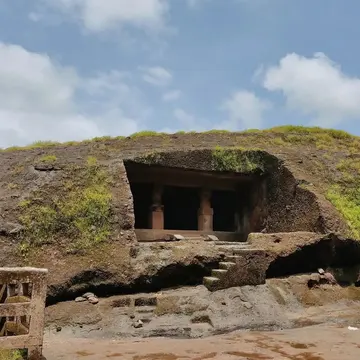 Discover the ancient rock-cut architecture and rich Buddhist heritage of the Kanheri Caves nestled inside Sanjay Gandhi National Park with our guided tour.