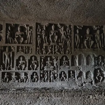 Discover the ancient rock-cut architecture and rich Buddhist heritage of the Kanheri Caves nestled inside Sanjay Gandhi National Park with our guided tour.